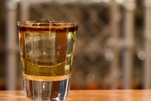 Bittered Holland Sling: Cardinal Barrel Rested Gin, Redbreast 12-year Irish Whiskey, Demerara Sugar, Boker's Bitters, Ron Zacapa 23-year Rum from Mixologist Joe Raya of The Gin Joint Bittered Holland Sling: Cardinal Barrel Rested Gin, Redbreast 12-year Irish Whis