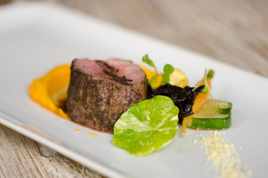 Bergamot-encrusted Australian Lamb, Kuri Squash, Smoked Black Trumpet Mushrooms, and Chestnuts from Chef Bill Greene of Artisanal Bergamot-encrusted Australian Lamb, Kuri Squash, Smoked Black Trumpet Mushrooms