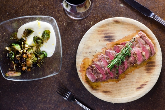 Grilled Secreto Ibérico, Brussel Sprouts, Cauliflower, and Yogurt-Celery Root Espuma from Chef Katie Button of Cúrate Grilled Secreto Ibérico, Brussel Sprouts, Cauliflower, Yogurt, and Yogurt-Celery